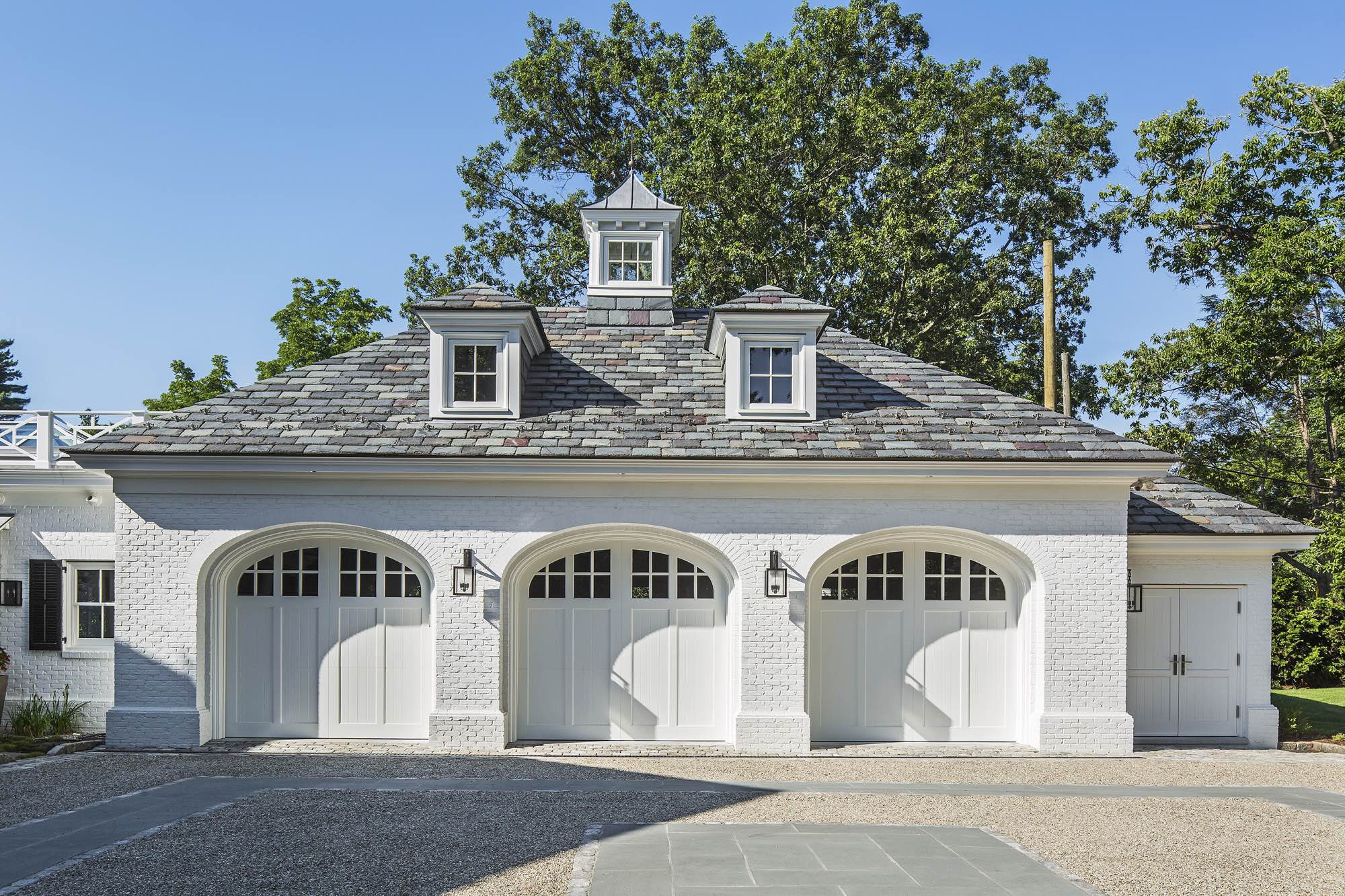 Three Garage Entrances on Colonial Home